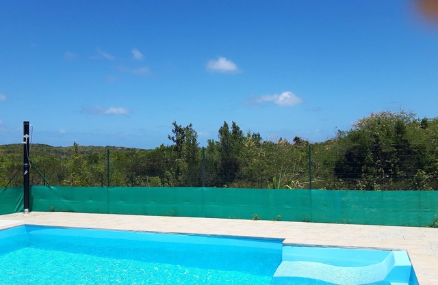 Accommodation with swimming pool quiet location in greenery 5 minutes from amenities and beaches