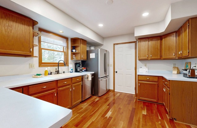 Action-Packed Waterfront Retreat with game room, hot tub, fire pit & more