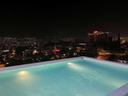 Affordable Luxury Rooms with Pool, Gym and Office Space
