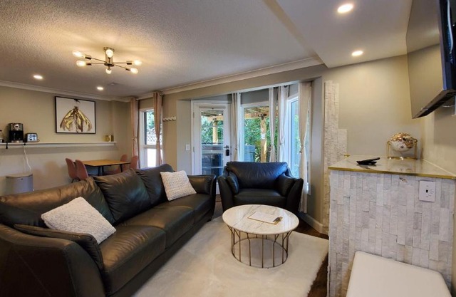 Airdrie Modern Walkout Bsmt Suite with Hot Tub