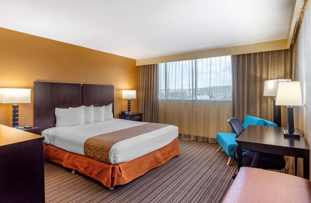 Airport Convenience | Deluxe King Room with Shuttle | Swimming Pool & Breakfast