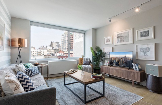 Airy East Village 1BR w/Doorman, Gym, near NYU, by Blueground