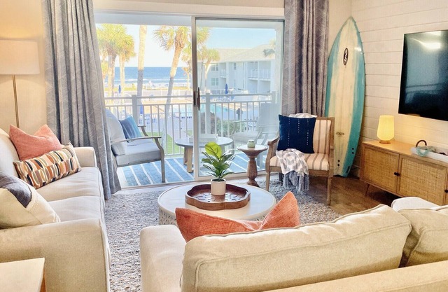 Amazing views of the ocean and pool from this coastal-modern, surfer-chic condo!