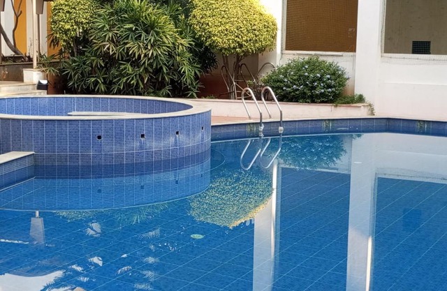 Amazistay offers Luxury room with private bathroom, balcony & 55 inch TV & shared Jacuzzi paid access, Book Lover, near Ramaiah College Hospital