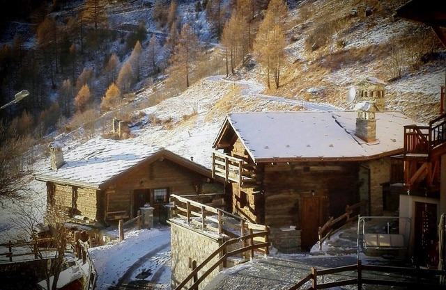 An ancient fairy-tale rascard, a chalet surrounded by nature