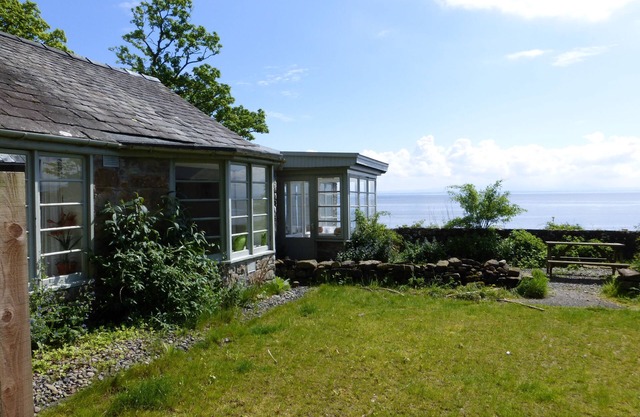 An idyllic seaside cottage right on the beach with stunning views. The most perfect position for a
