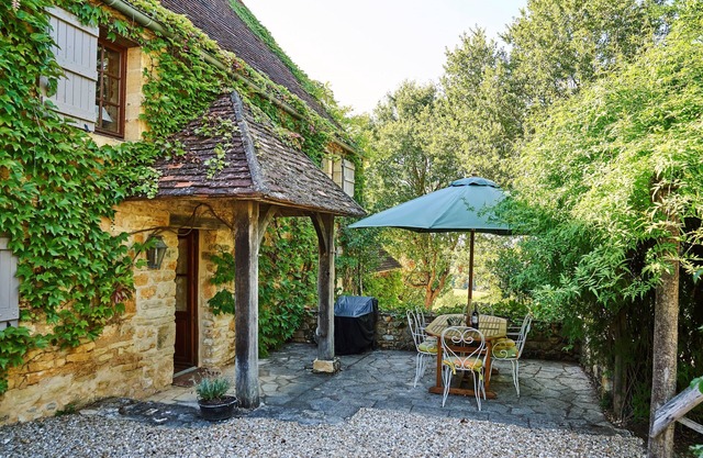 An old stone cottage full of rustic charm with pool and stunning views