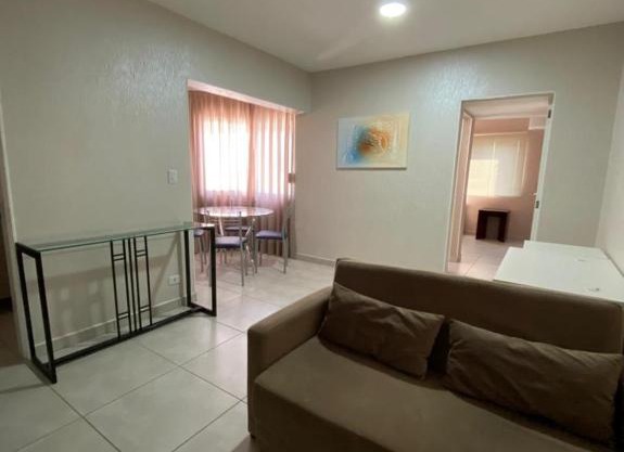 Ap flat central- ar, garagem e ótima localização