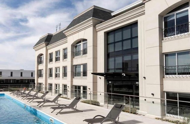 Apart France - Monoambiente con piscina y estacionamiento