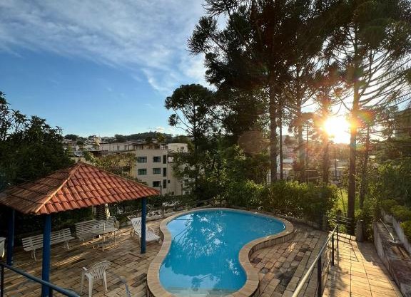 Apartamento aconchegante em condomínio encantador.