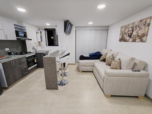 Apartamento moderno frente a la Universidad Santo Tomás WiFi y parqueadero