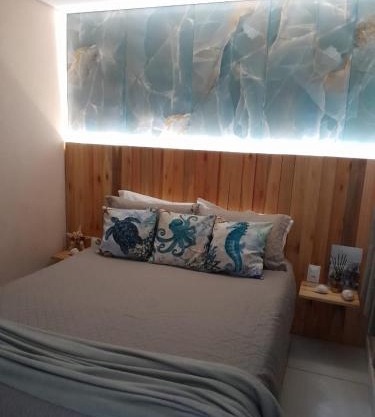 Apartamento térreo climatizado próximo a praia