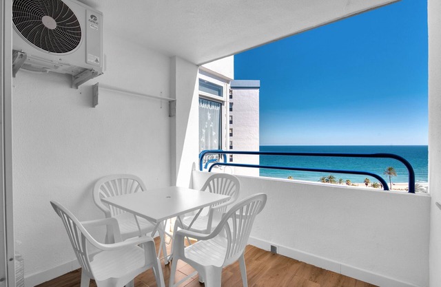 Apartment 'Playa Puig' with Shared Pool, Wi-Fi and Air Conditioning
