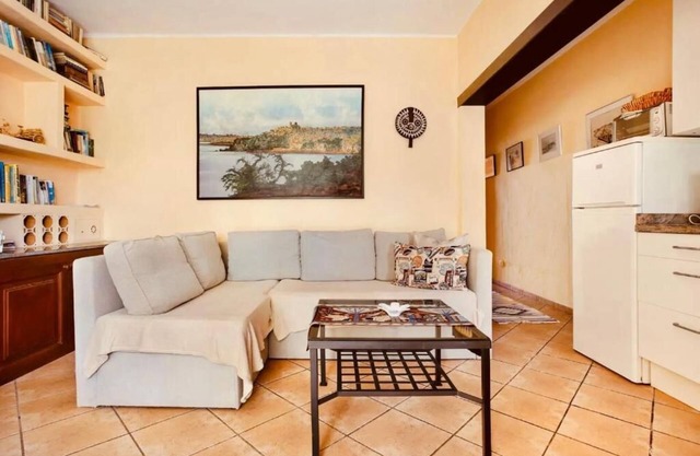 Apartment 1 with panoramic window in the bedroom facing the sea and Risco Famara