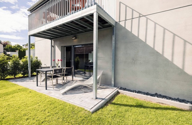Apartment 'Ferienwohnung Gartenglück 75qm' with Private Terrace, Shared Garden and Wi-Fi