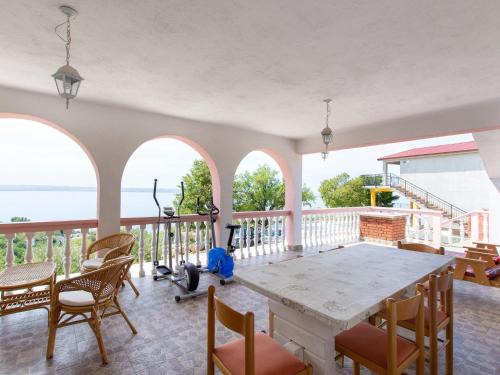 Apartment in Tribalj with Sea View and Beach