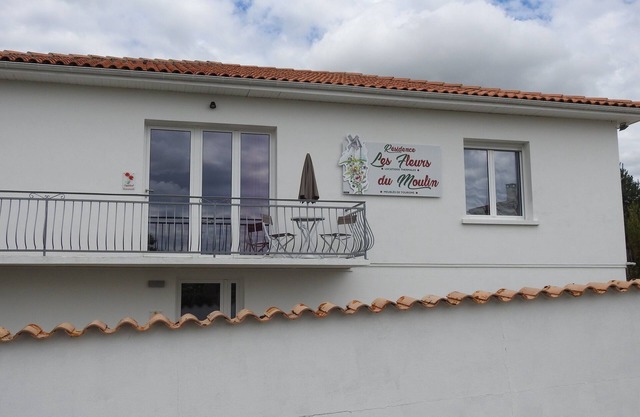 Apartment located on the ground floor of a small residence with four