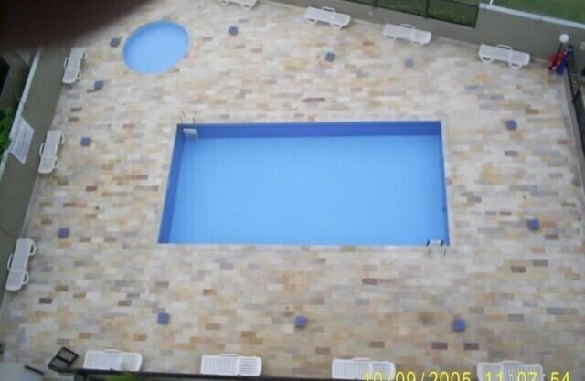 Apartment on the beach, walk in the sand in Itanhaem, with pool and sea view