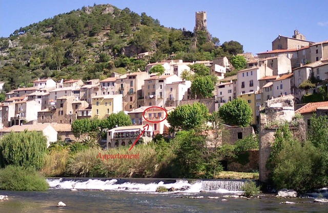 Apartment rental overlooking the river in the heart of the village of Roquebrun