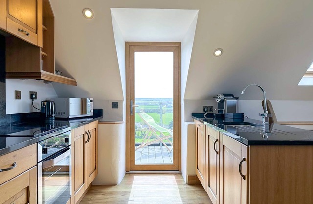 Apartment Style Barn with Balcony, Sea and Countryside Views