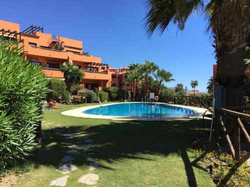 Appartement cosy avec piscine & plage à 5 min à pied