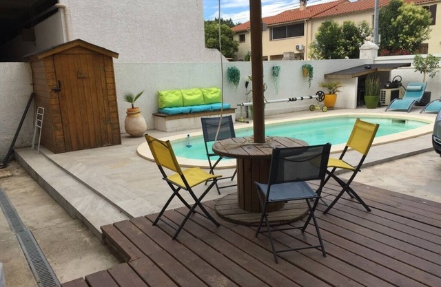 Appartement Rez de Jardin Piscine Chauffée, Barbecue, Plancha