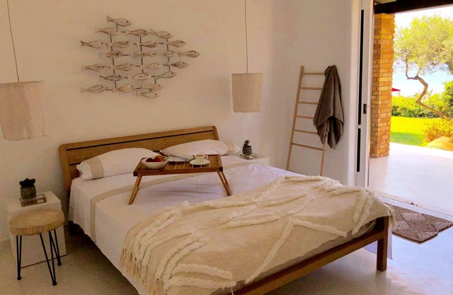 Aqua beach house Glyfada sea front with garden in Corfu, Greece