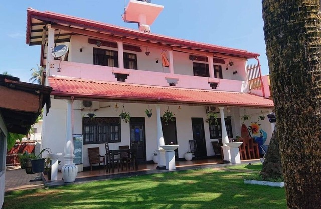 Ashen’s Beach House , Boossa , Sri Lanka . (Beachfront Villa with 4 A/C rooms)