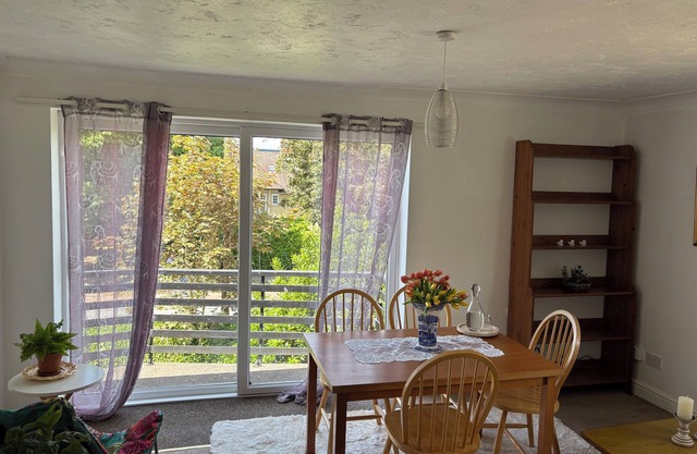 At a serene location opposite to the house of a double Nobel laureate