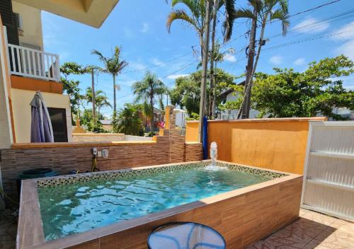 ATAMI STAY Casa em Condomínio com Piscina Aquecida pertinho do Mar