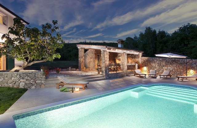Attractive villa with private swimming pool, beach volleyball and fenced garden