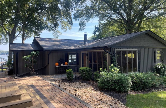 Awake to the sunrise and long lake views from quaint updated cottage!