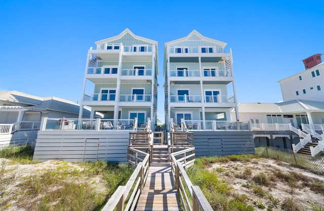 "Awave From It All" Beachfront + Private Pool w/Beach Chairs & Umbrellas Included! Equipped with an Indoor Elevator!