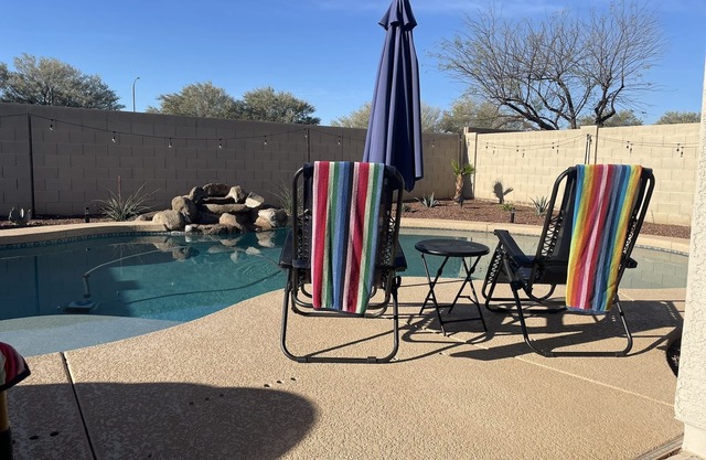 AZ Sun & Serenity: 4BR home w/Heated Pool, BBQ Island, Prime location– Sleeps 12