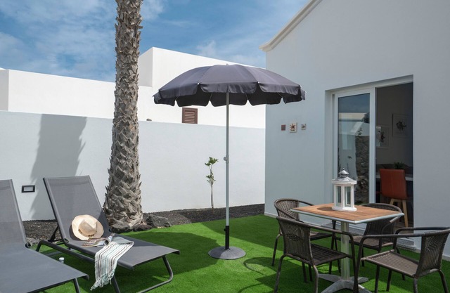 B1, in a small complex with communal heated pool 100m from the sea