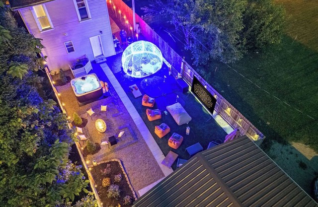 Backyard Escape: Outdoor Movie, Dome, Mini Golf, hot tub, fire pit, grill, mural