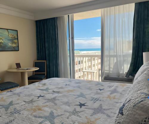 Bang For Your Buck Hotel Condo On Daytona Beach with Kitchen and Ocean View