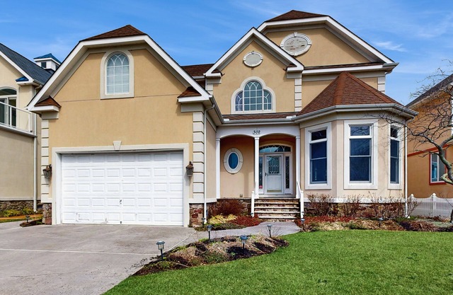 Bayfront home with WiFi, fireplace, & pool