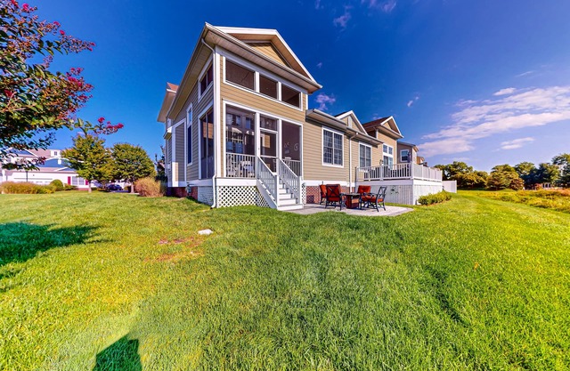 Bayside Resort townhome with nautical-theme, resort amenities, & water views