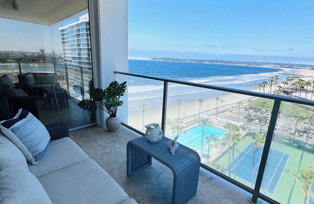Beach and city views in condo with backyard access to beach and walkable town.