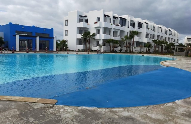 Beach apartment with sea view and swimming pool