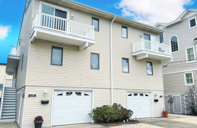 Beach block/ocean view. Located steps to one of Sea Isle's most popular beaches; with play area and rest rooms.