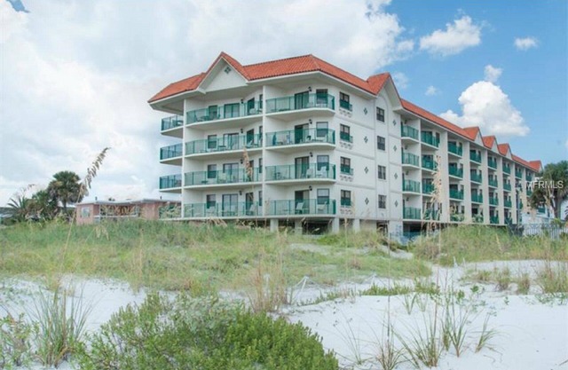 BEACH FRONT CONDO on the sugary sands of the Gulf of Mexico.