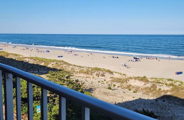 Beach front condo with ocean front balcony, swimming pool, tennis, pickle ball