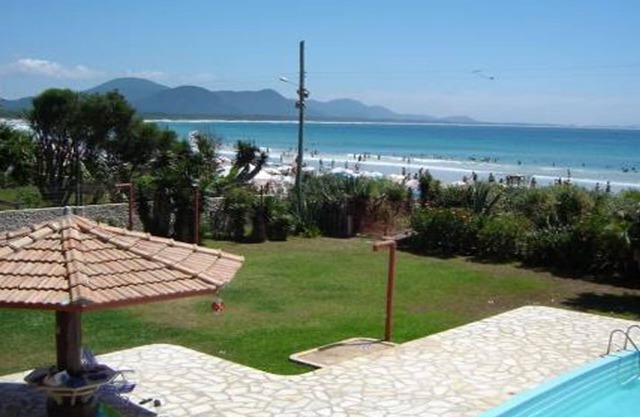 Beach front house with pool bar lagoon season