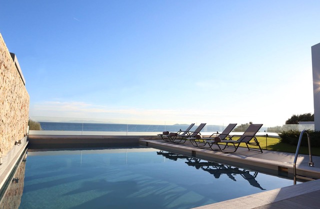 Beach front villa with private sea water pool & amazing sea view to Saronic golf