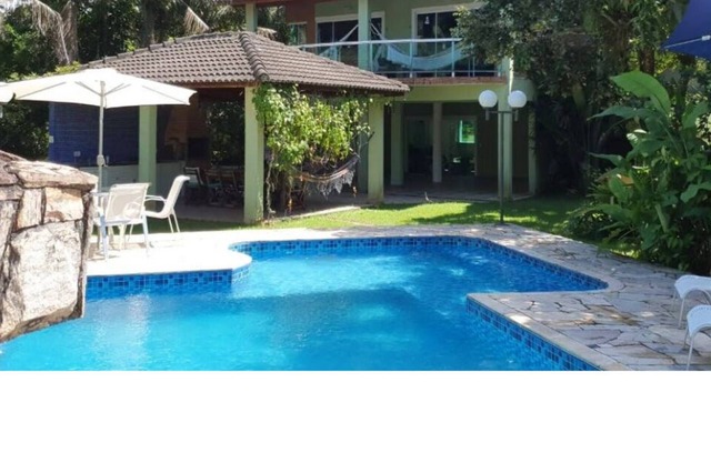 Beach house on the sand 30m from gated community Costa do Sol Guaratuba Bertioga