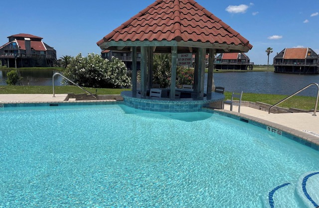 Beach Retreat Minutes to the Beach and just steps to the Pool!