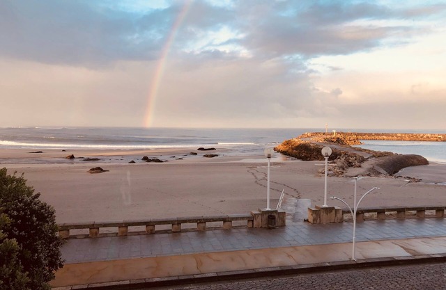 Beachfront accommodation, shared rooms with all amenities.