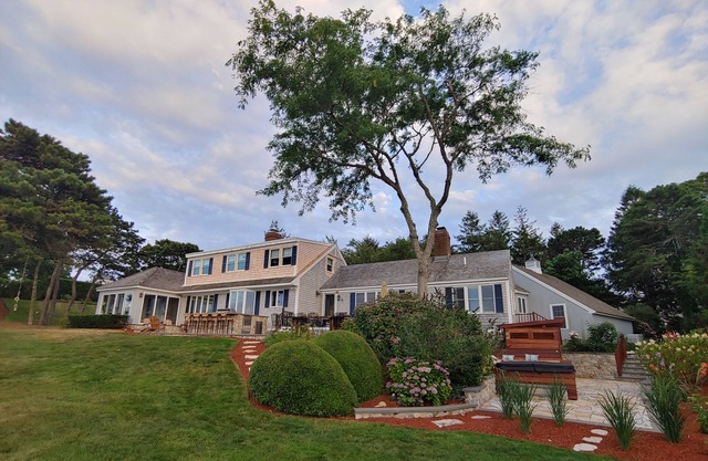 Beachfront Cape w/ Dock Hot Tub Fire Pit Outdoor Kitchen Boats Kayaks - Pets Ok!